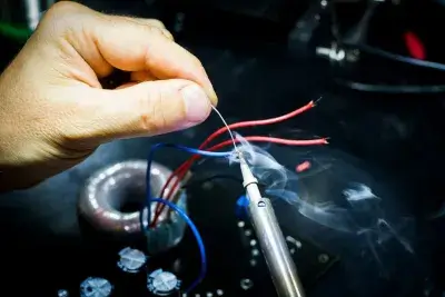 Technician repairing audio equipment